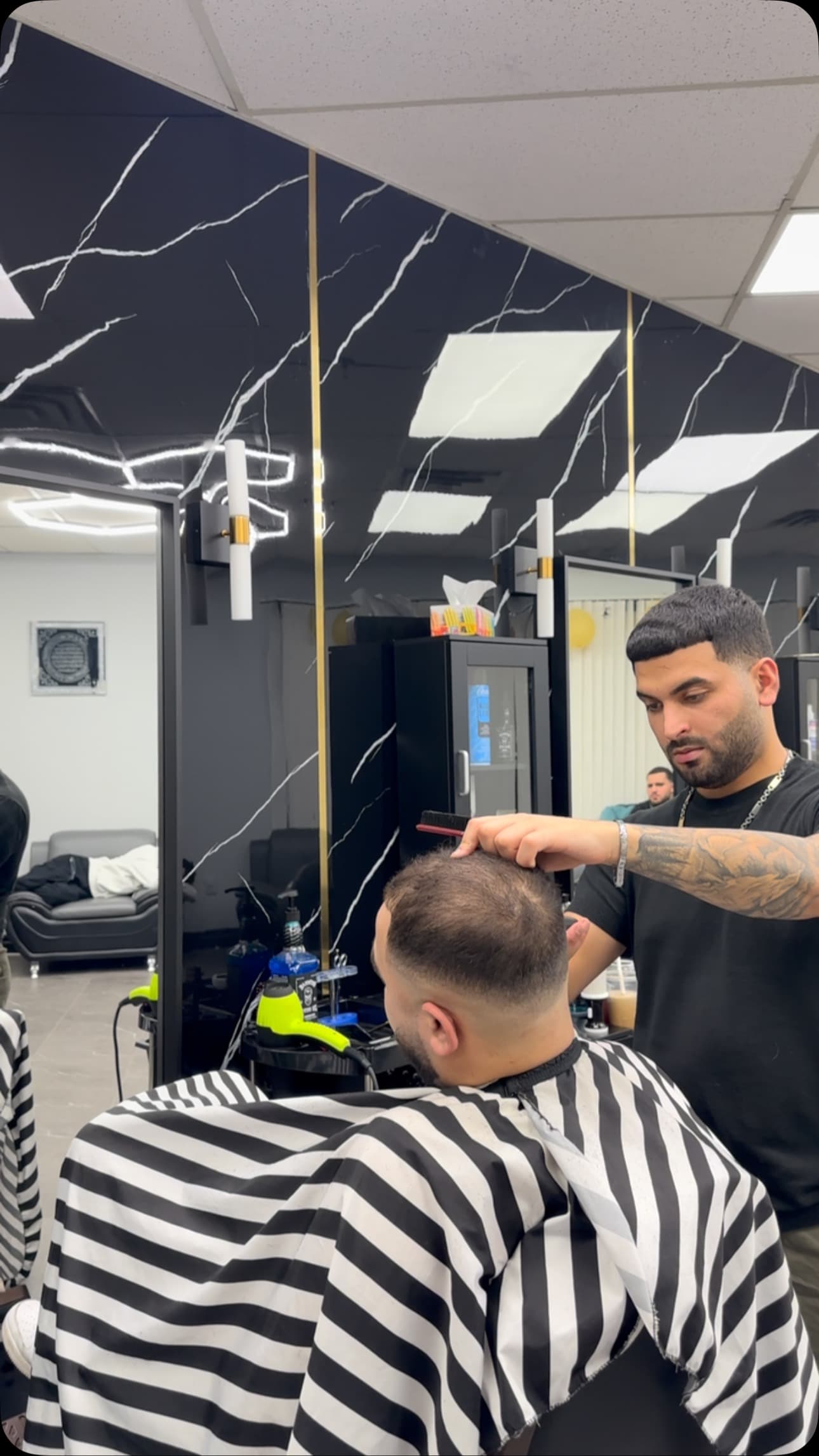 Arkan Barber at work